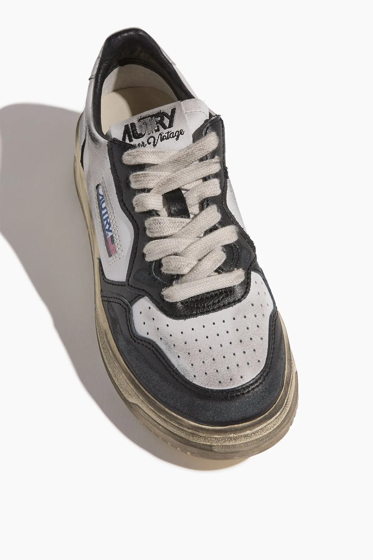 Super Vintage Low Top Sneakers in White/Black/Silver